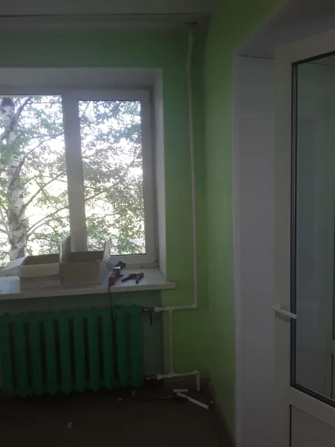 Подключение радиатора к новой подводке отопления в доме престарелых в Кудымкаре
